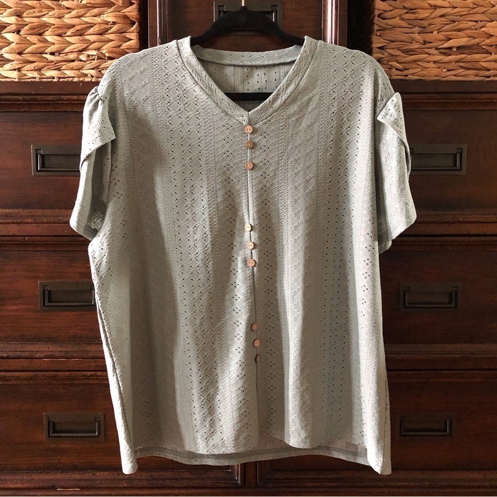 Green stretch knit blouse in size XL